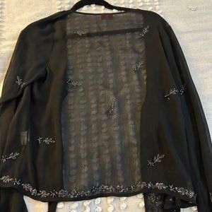 A black sheer fancy jacket